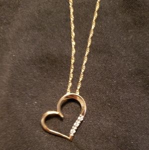 This is a stunning BNWB 10k gold necklace with heart pendant.